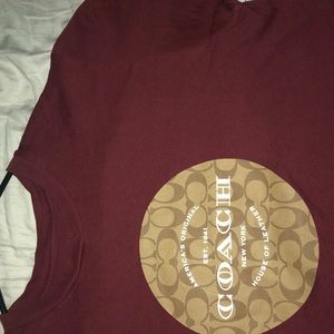Maroon small coach shirt (fits a medium)
